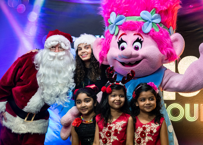 Santa Claus with female Troll and three young girls at Cumberland Christmas Celebration 2020